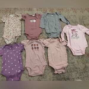 Assorted Baby Onesies in Pink, purple, and Gray
